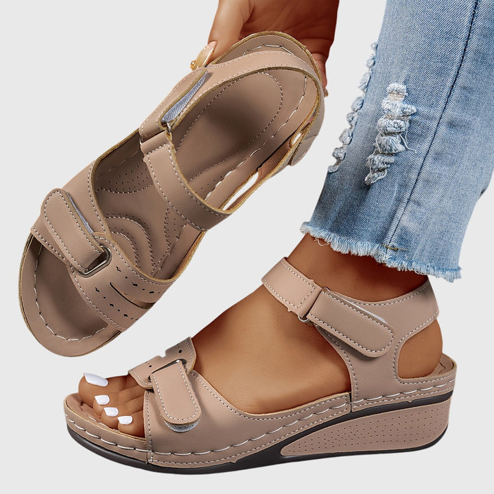 Women's comfortable walking sandals for summer. Features crystal detail, stability, & arch support.