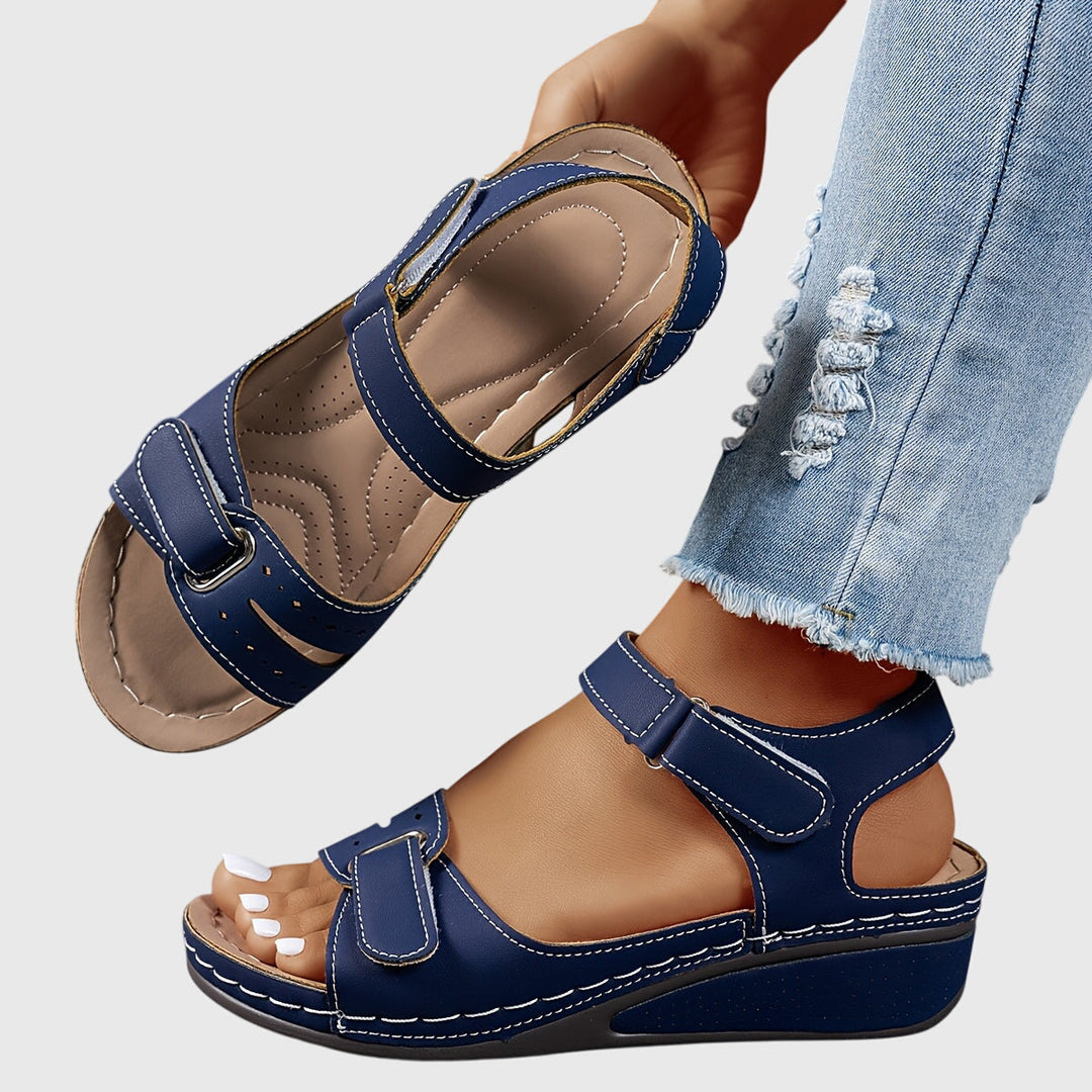 Orthopedic women's sandals with crystals for foot pain relief. Offers arch support & non-slip grip.