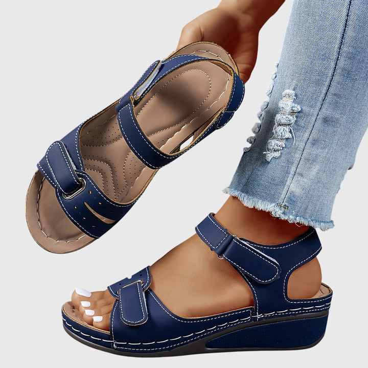 Orthopedic women's sandals with crystals for foot pain relief. Offers arch support & non-slip grip.
