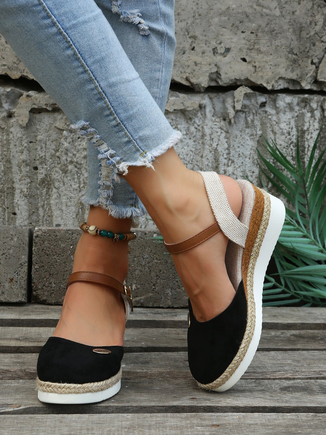 Close-up of comfortable slip-on women's orthopedic sandals, showcasing arch support & cushioning.