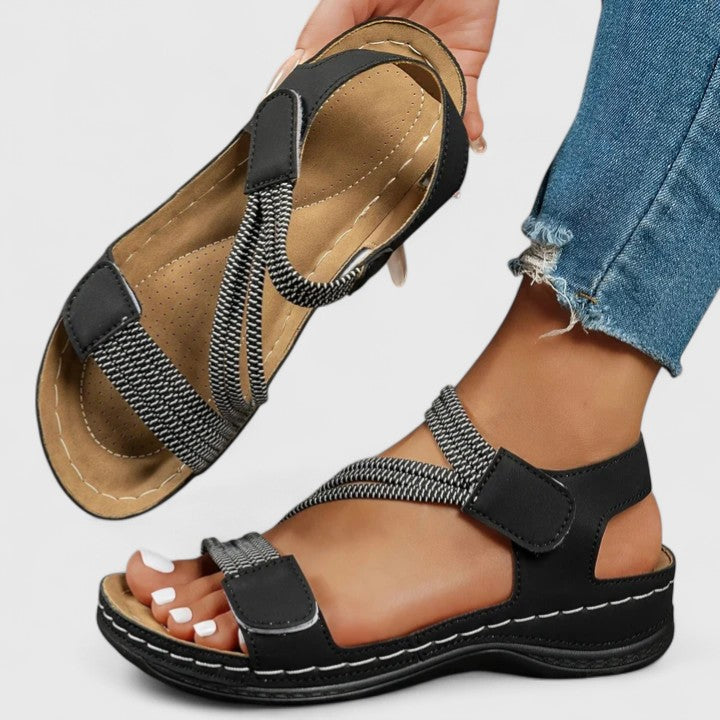 Walk pain-free in women's orthopedic sandals with three-arch support for plantar fasciitis.