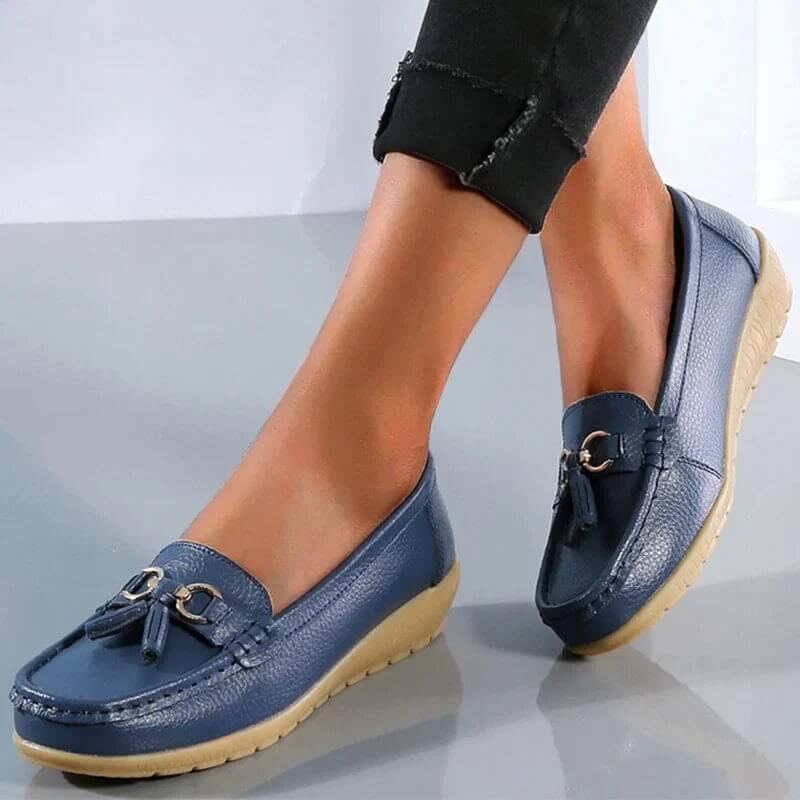 Detail shot of women's orthopedic slip-on loafers, highlighting quality material and comfortable design for feet.