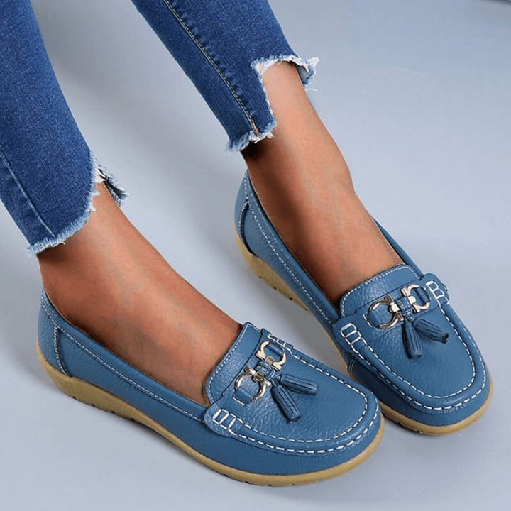 Top-down view of comfortable women's orthopedic slip-on loafers, ready for versatile everyday walking.