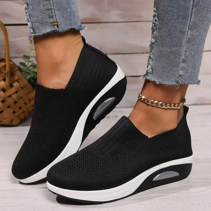Pink women's slip-on orthopedic sneakers with arch support; perfect lightweight casual walking shoes for comfort.