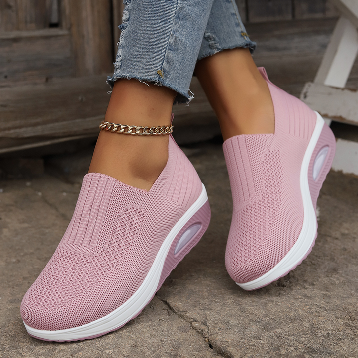 Comfortable women's orthopedic slip-on walking sneakers in various colors, with arch support for daily wear.
