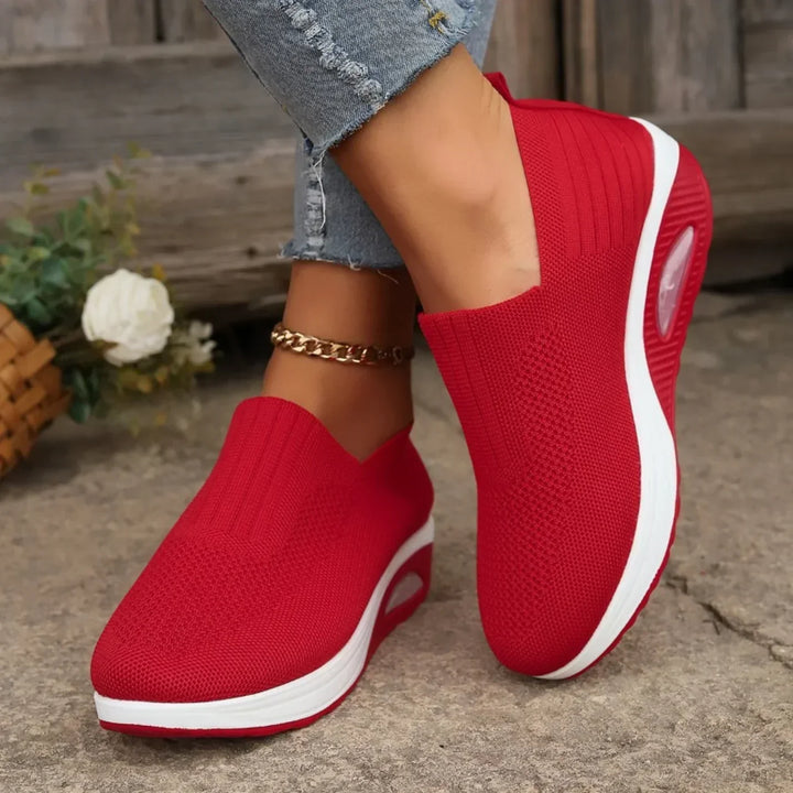 Breathable women's everyday slip-on sneakers, designed for orthopedic arch support and long-lasting comfort.