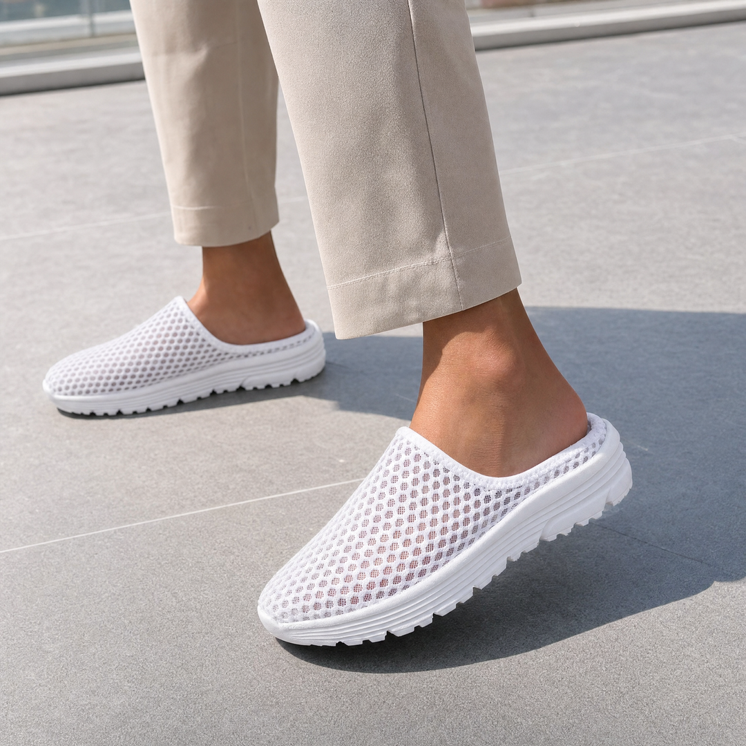 Comfortable women's slip-on sneakers for easy wear, featuring orthopedic design and cushioned arch support.