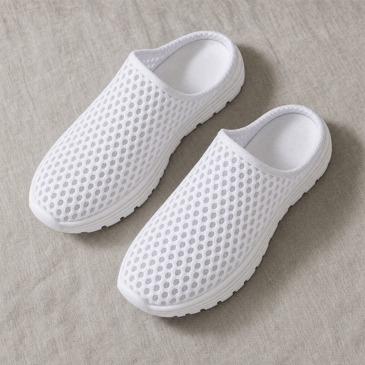White women's orthopedic slip-on sneakers, perfect for everyday walking with excellent arch support.