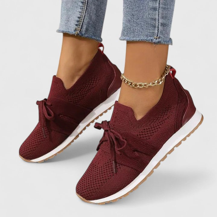 Supportive women's orthopedic slip-on walking shoes. Comfortable, breathable sneakers for daily casual wear.