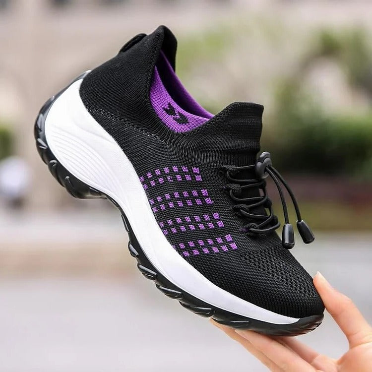 Women's orthopedic sneakers for foot pain relief, featuring supportive arch & comfortable wide toe box for walking.