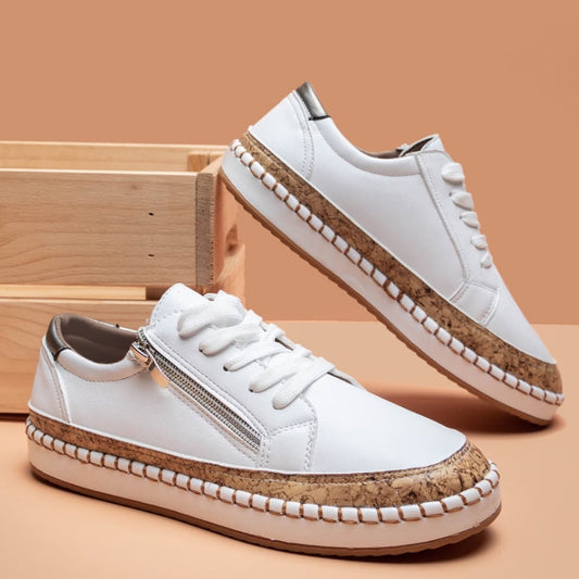 Women's orthopedic sneakers with arch support, comfortable for walking. Easy side zip closure for daily wear.