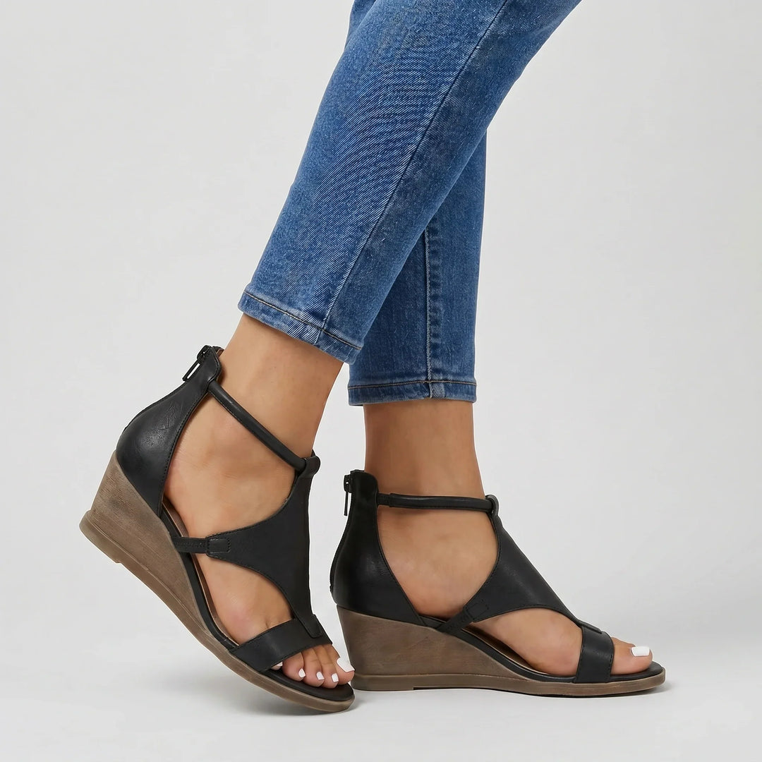 Stylish women's strappy orthopedic summer sandals, offering supportive arch comfort & warm weather relief.