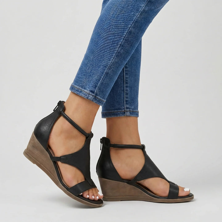 Stylish women's strappy orthopedic summer sandals, offering supportive arch comfort & warm weather relief.