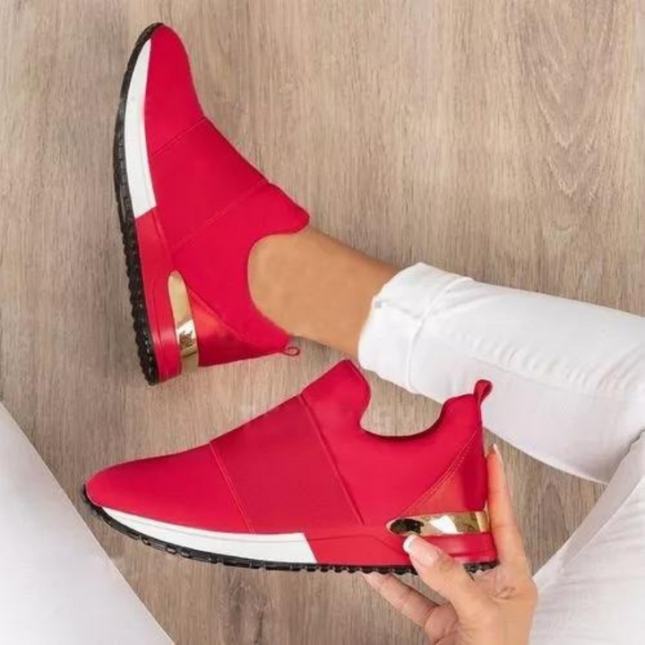 Side view of comfort-focused women's walking shoes. Excellent arch support for foot health.