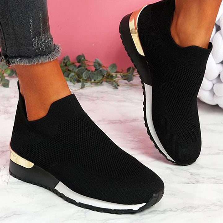 Detail of the cushioned interior & strong arch support in women's comfort walking shoes.