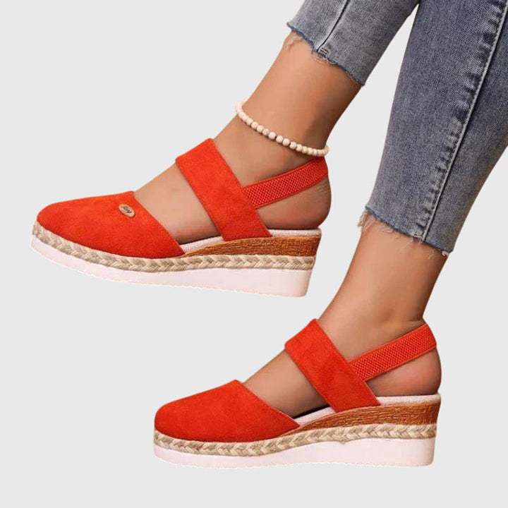 Supportive women's orthopedic sandals, cushioned for walking comfort, ideal for foot pain relief.