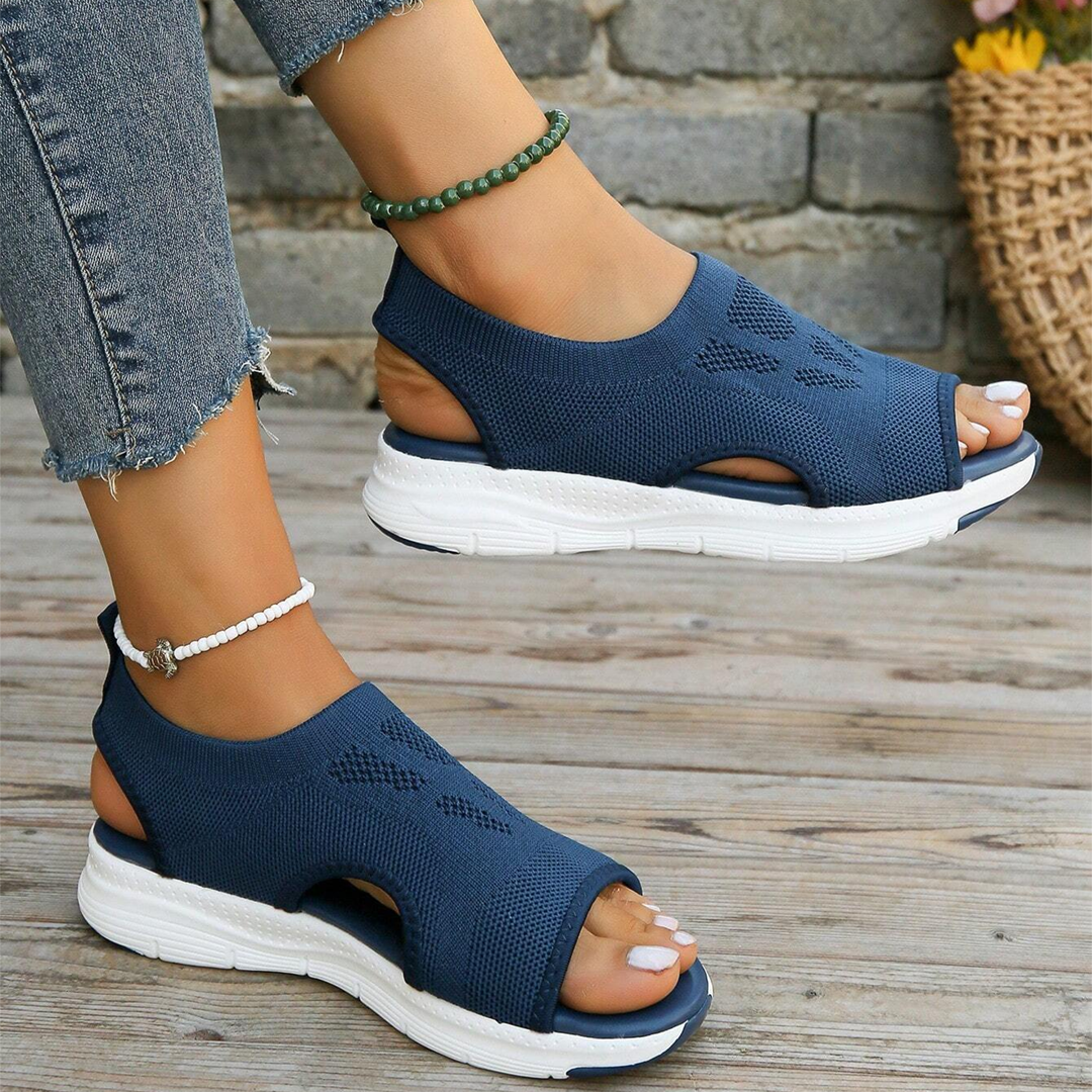 Durable women's comfort sandals with adjustable straps & orthopedic features.