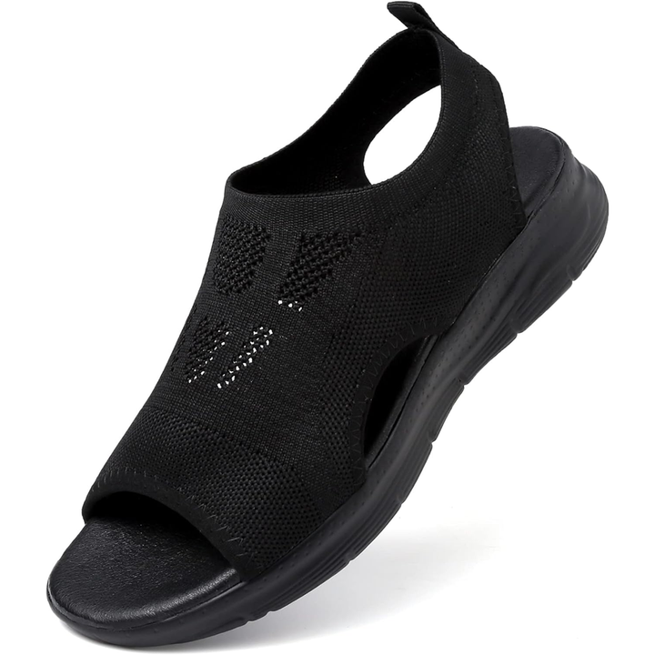 Comfortable women's sandals featuring orthopedic arch support & adjustable straps.