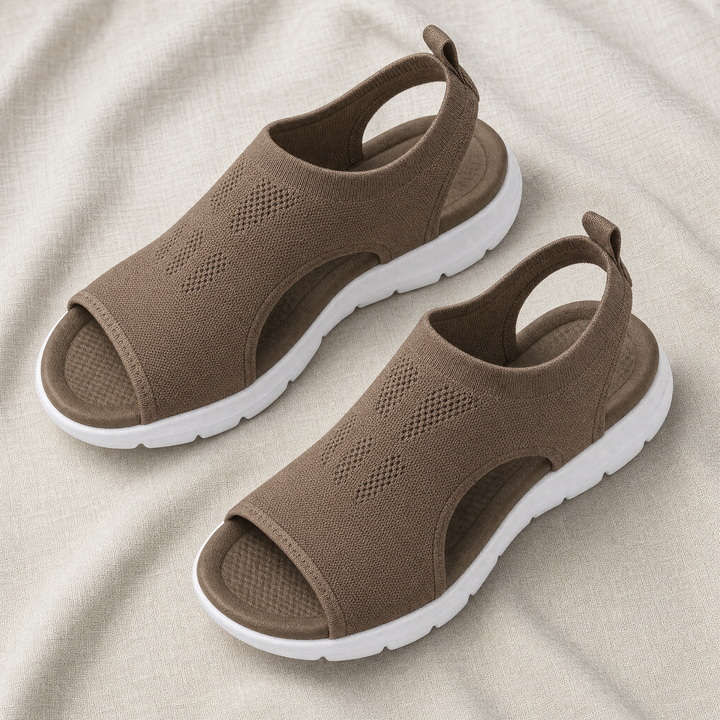 Adjustable women's orthopedic sandals with arch support, perfect for active walking.