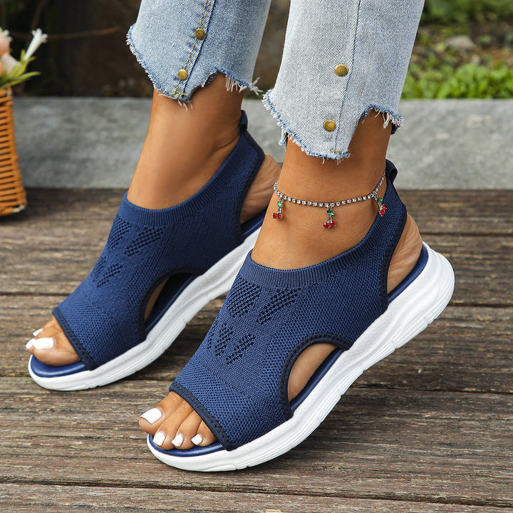 Durable women's walking sandals, orthopedic arch support, adjustable straps for comfort.