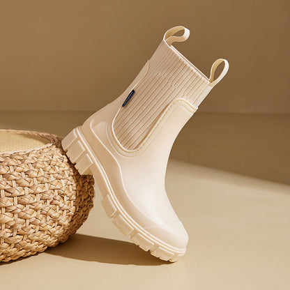 Stylish women's waterproof ankle boots, designed for rain, snow, & all-weather protection.