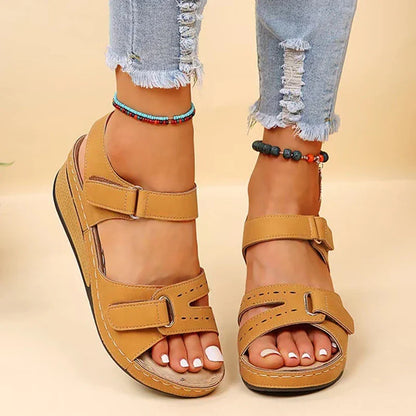 Close-up of women's orthopedic wedge sandals, highlighting ergonomic design and premium materials.