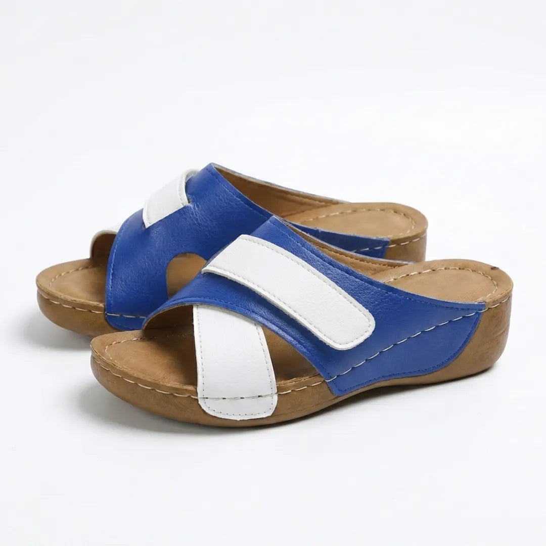 Brown women's wedge sandals with arch support, perfect for casual wear.