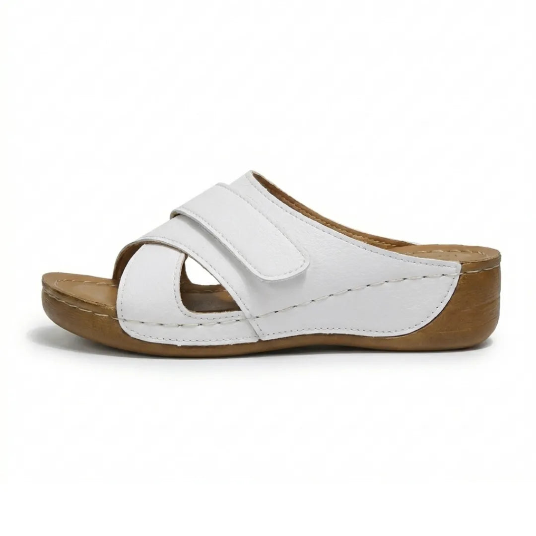 Women's casual summer wedge sandals with supportive footbed and adjustable straps.