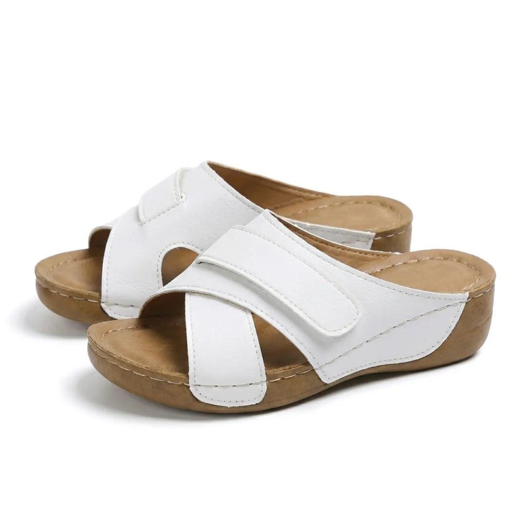 Durable women's walking wedge sandals, black, offering long-lasting comfort.