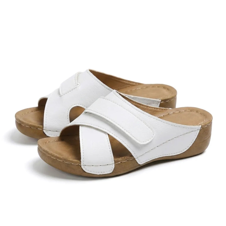 Durable women's walking wedge sandals, black, offering long-lasting comfort.