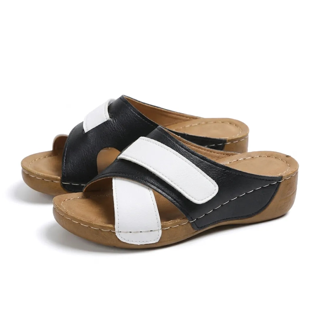 Ergonomic women's orthopedic sandals, brown, with arch and foot support.