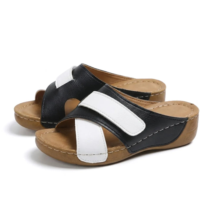 Ergonomic women's orthopedic sandals, brown, with arch and foot support.