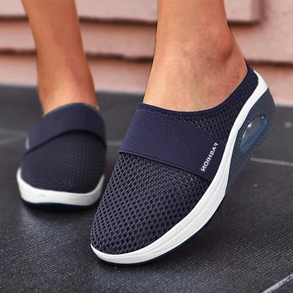 Stylish women's orthopedic wedge sandals with ergonomic design for maximum foot comfort & stability.
