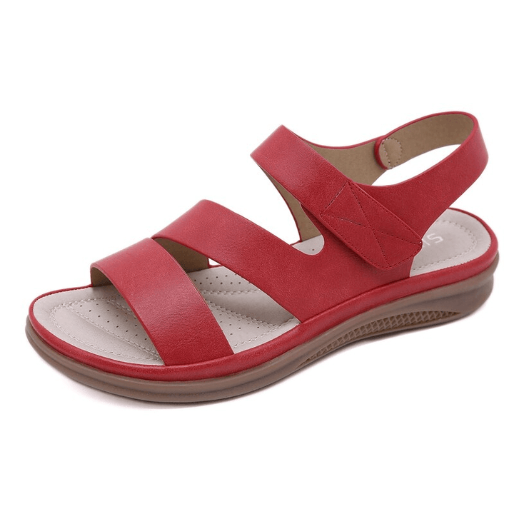 Stylish women's wedge sandals providing orthopedic arch support and all-day comfort.