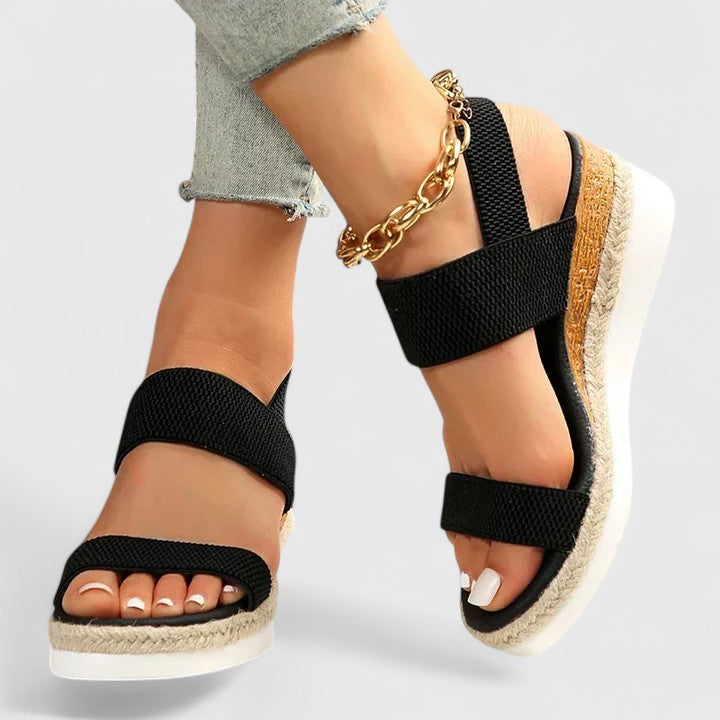 Stylish open-toe orthopedic wedge sandals for women, offering casual elegance & support.