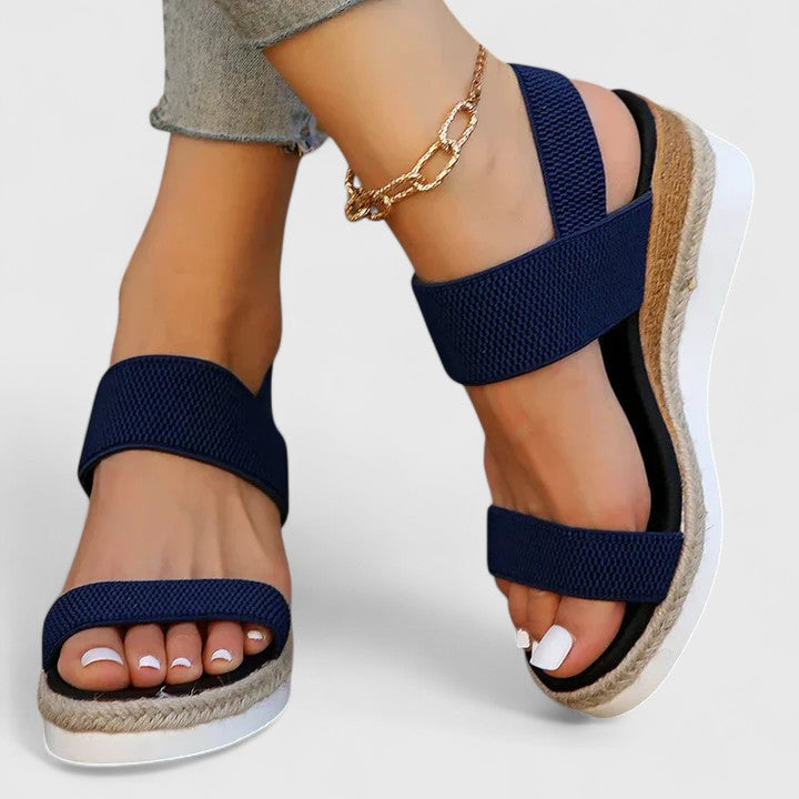 Slip-on open-toe wedge sandals for women, featuring orthopedic arch support & casual style.