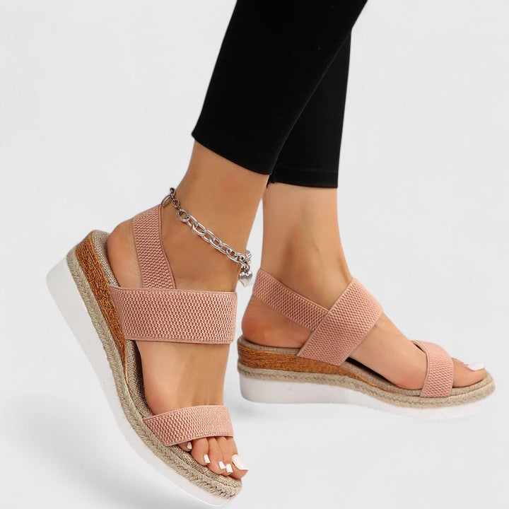 Casual women's wedge sandals with ergonomic arch support, ideal for everyday comfort.