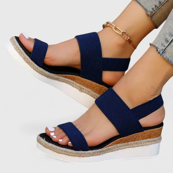 Foot pain relief with women's orthopedic open-toe wedge sandals, designed for ultimate comfort.