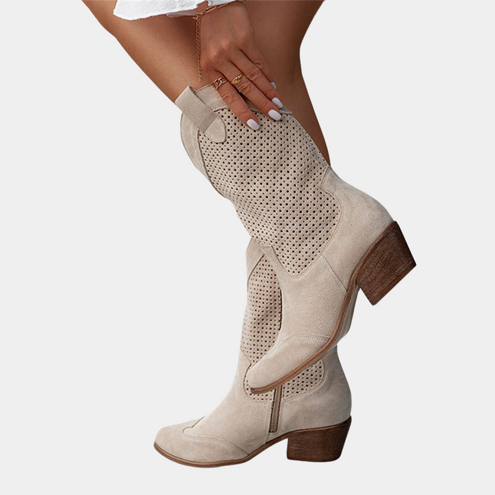 Comfortable women's orthopedic cowboy boots, western-style with a stacked heel. Fashionable pull-on footwear for support.