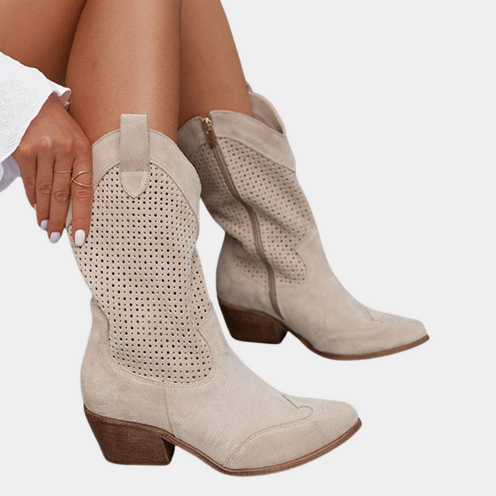 Elegant women's western boots. Orthopedic design ensures all-day comfort. Features stylish stacked heel & pull-on ease.