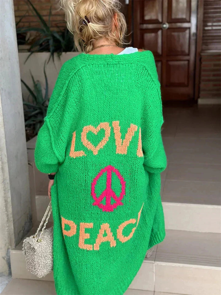 Fashionable oversized bohemian knit cardigan for women, statement peace love design.