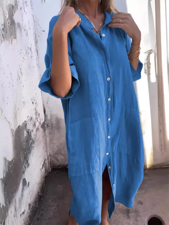 Women's fashion oversized button-down midi shirt dress, featuring practical pockets & a relaxed fit.