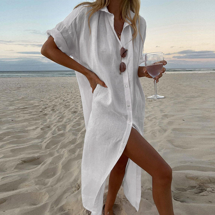 Women's button-down shirt dress with oversized fit & roll sleeves, a must-have for summer vacations & elegant beach style.