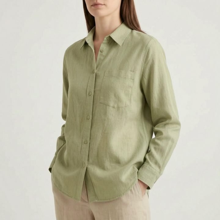 Chic women's oversized button-down shirt. Versatile long sleeve top for stylish, relaxed outfits.