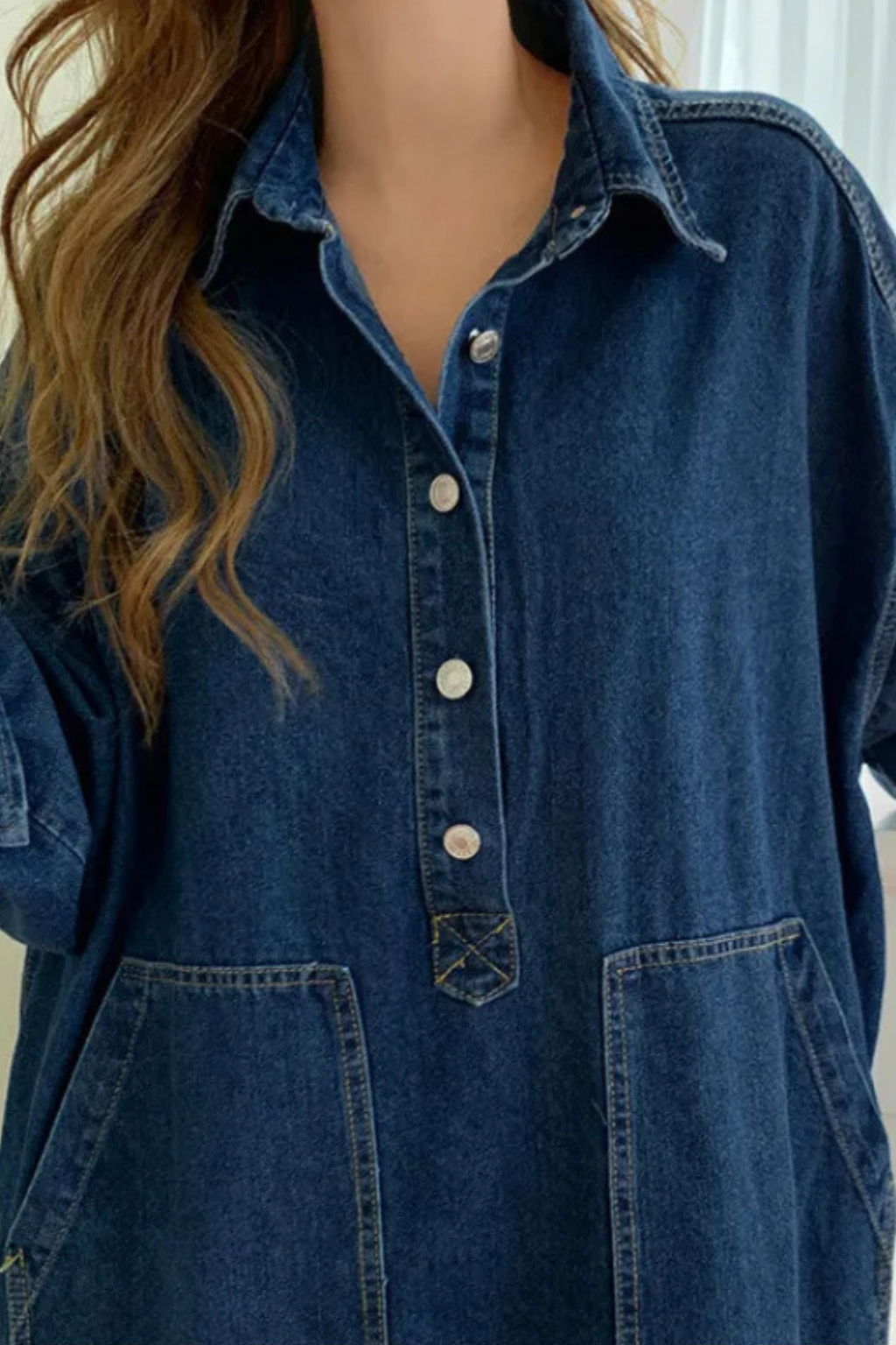 Flowy women's oversized maxi shirt dress with full button-front and handy pockets. A chic long casual dress for any season.