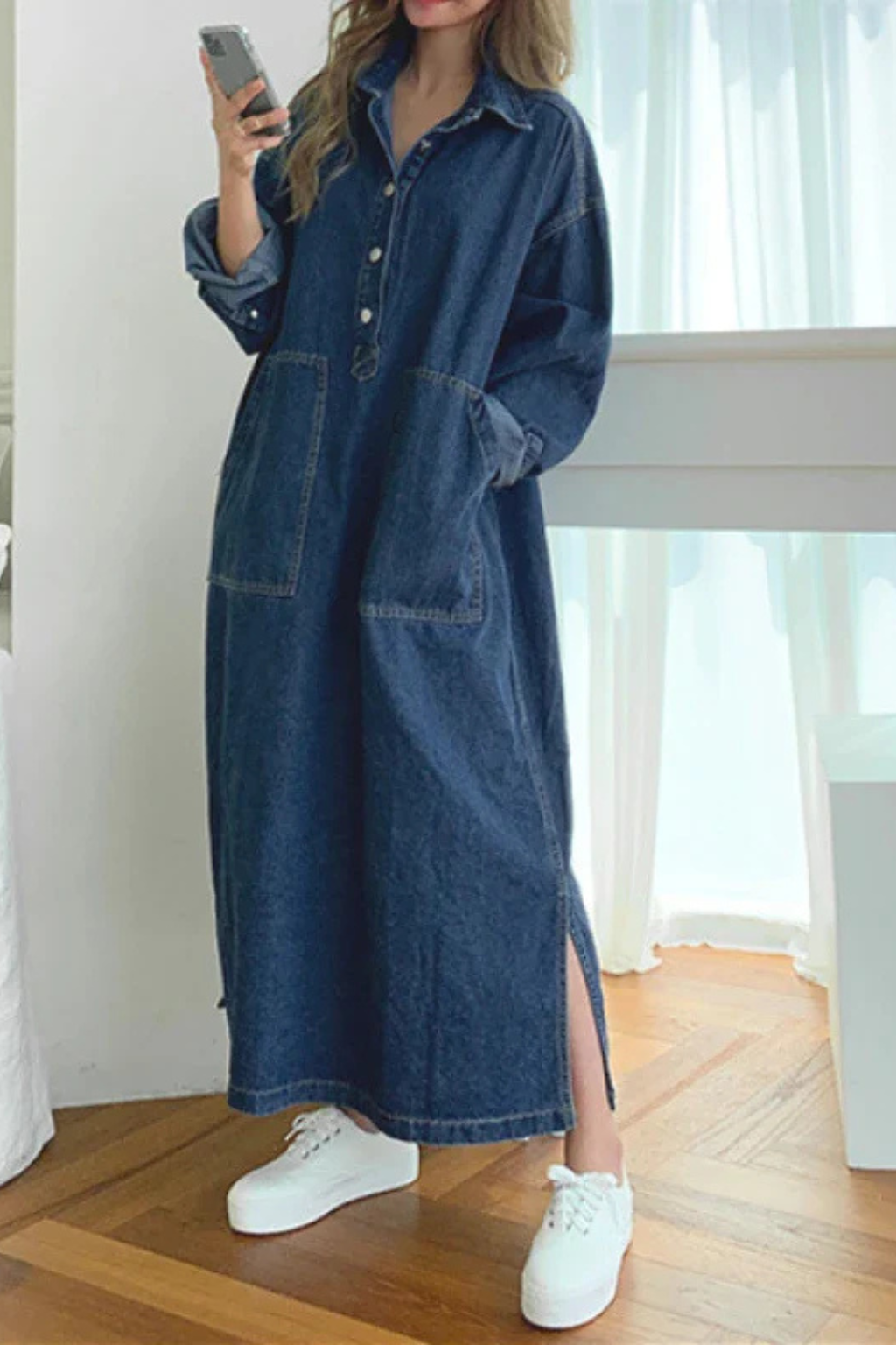 Casual women's oversized shirt dress. This comfortable maxi dress with button-front and pockets is ideal for everyday fashion.