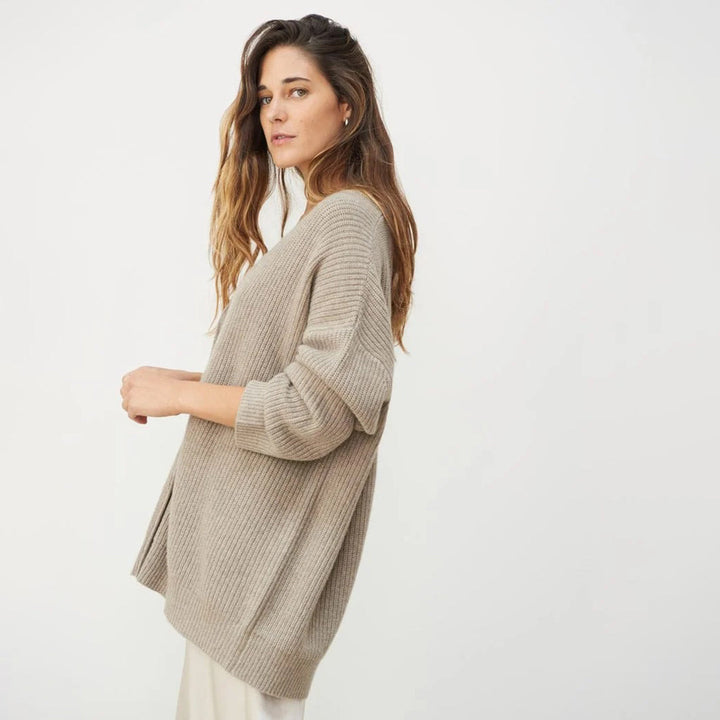 Long sleeve, relaxed fit women's oversized button-up cardigan, a fall layering staple.