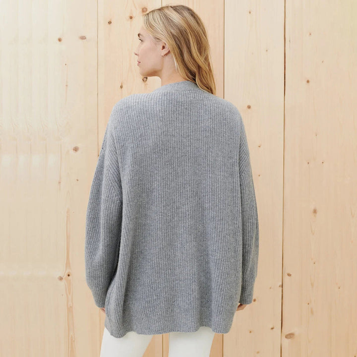 Soft knit button-up v-neck cardigan, an essential oversized sweater for women.