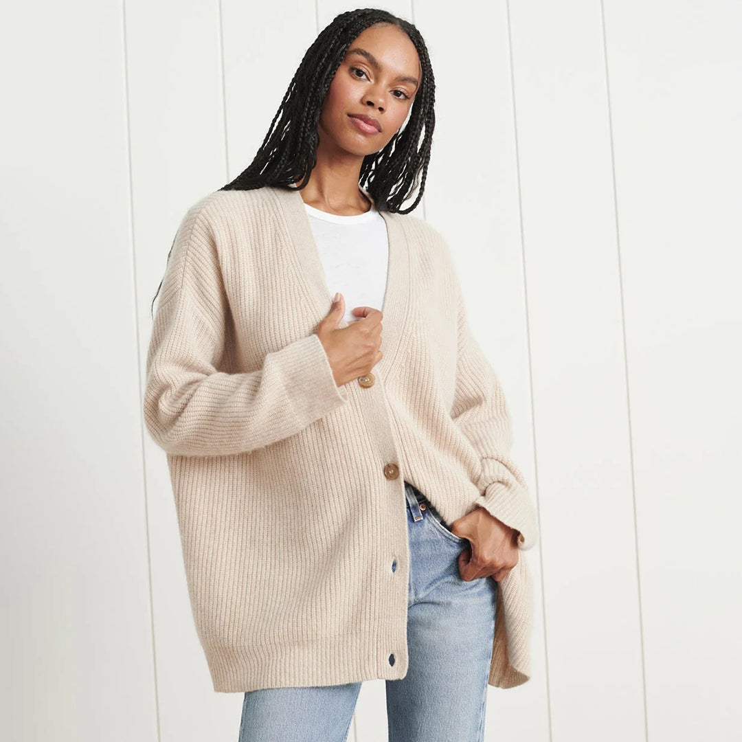 Fall fashion women's oversized button-up cardigan, a cozy knit long sleeve sweater.