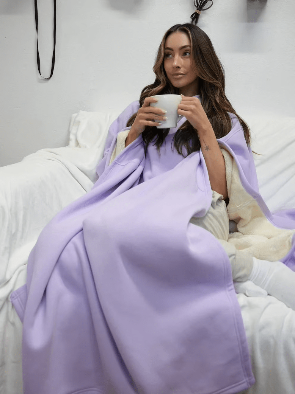 Cozy women's oversized hoodie, perfect for lounge fashion and serene relaxation.